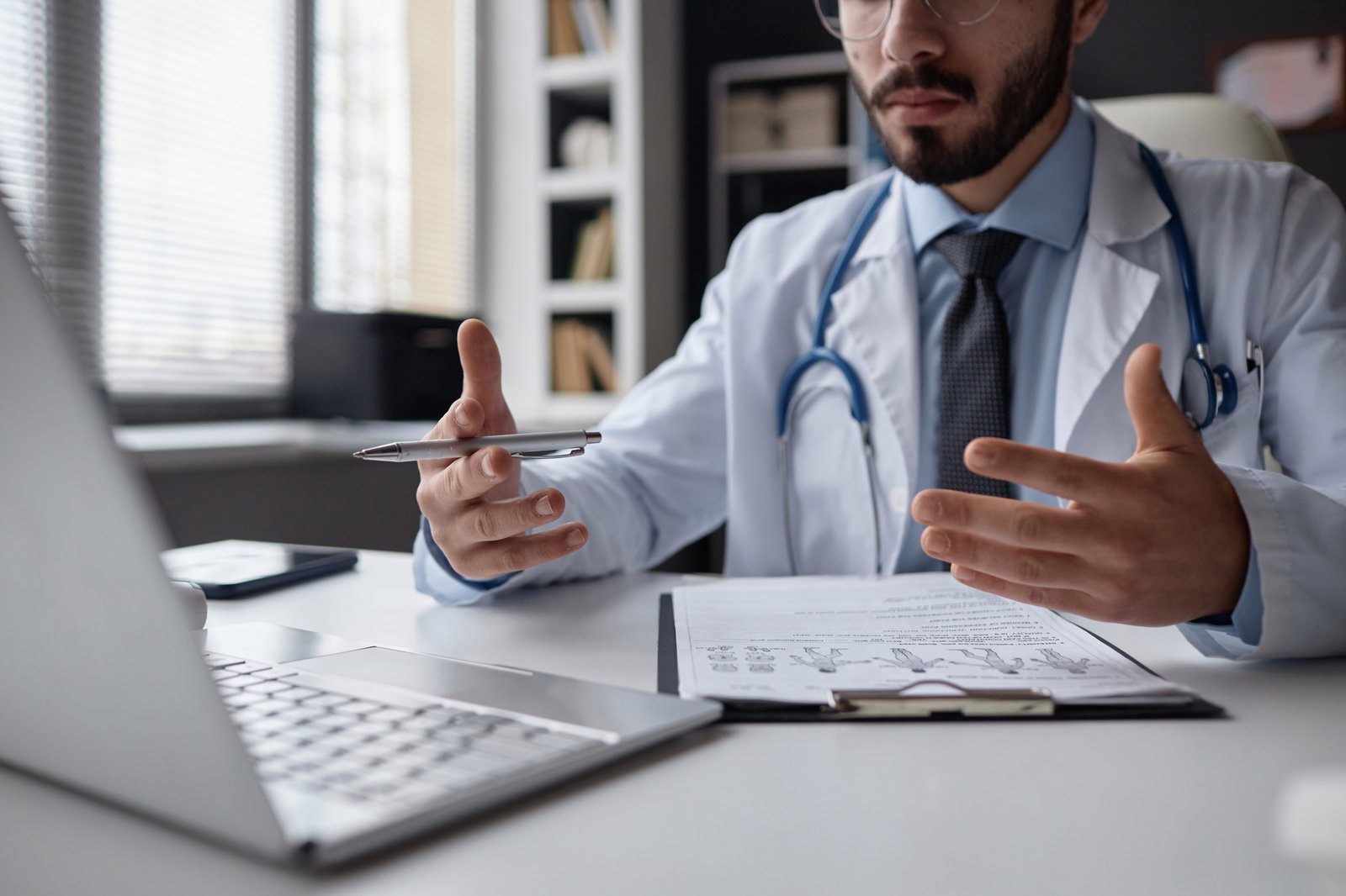 Male Doctor Consulting on Video Call